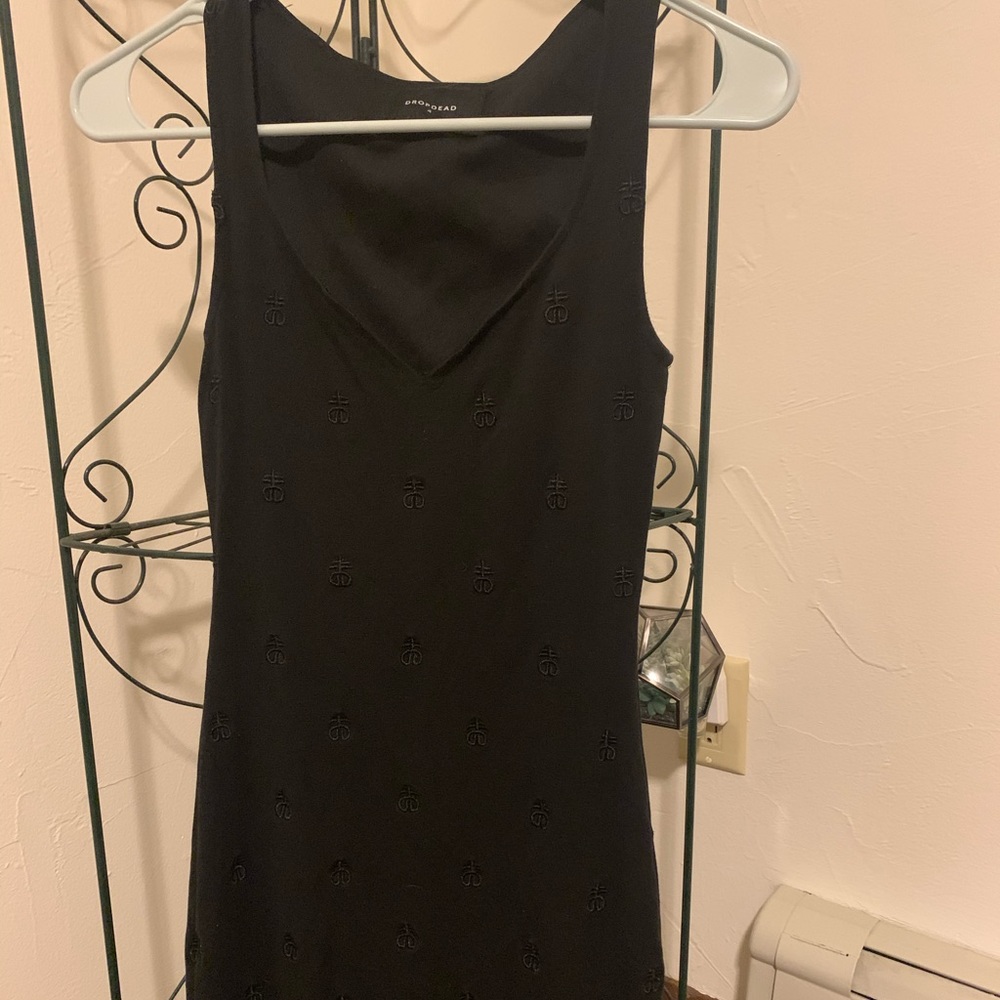 Drop dead black “confession” dress size 4
